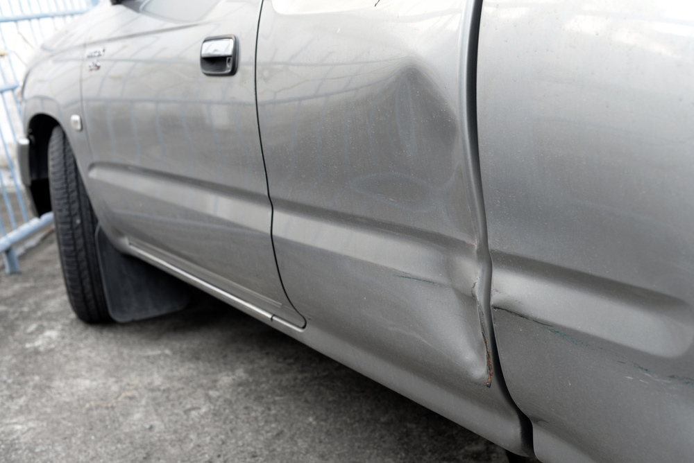 A Vehicle Panel With Visible Dent